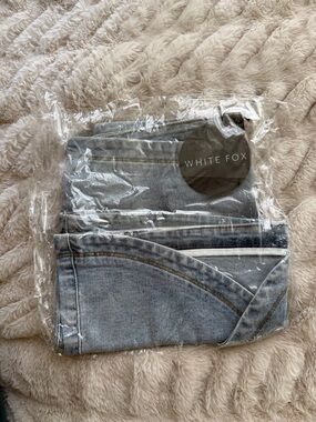 White Fox Boutique Light Wash Mini Skirt